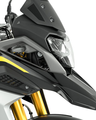 We see the side view of the front of the G 310 GS with a focus on the black tinted windscreen.. European Model Shown.