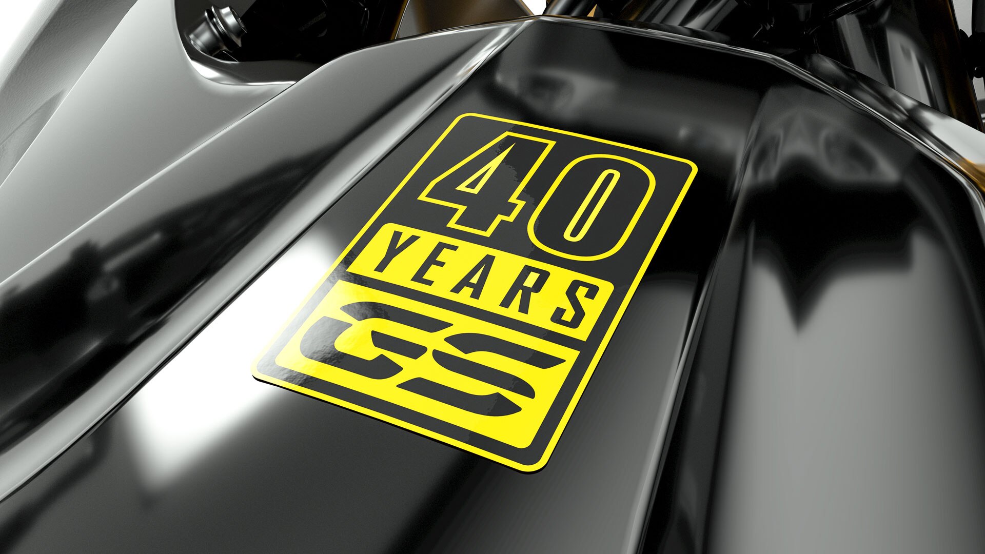 We see a close-up of the yellow 40 Years GS sticker.