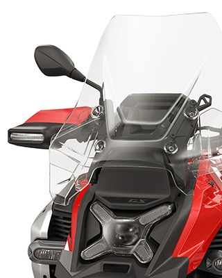 High windscreen/hand protector with integral turn signal as standard