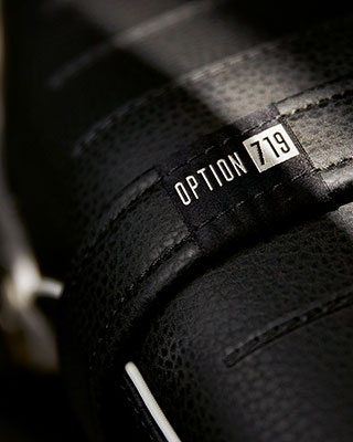 Detail shot of the seat bench with Option 719 label and white edge stripping.
