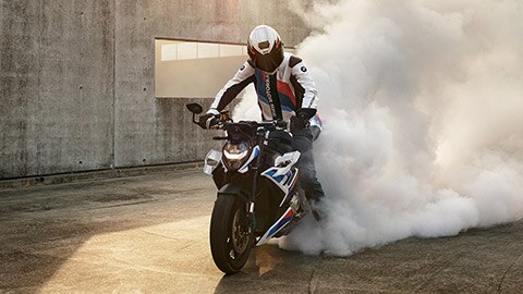 M R burning out the rear tire