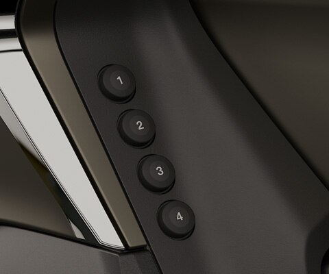 Focus on the four numbered Favorites buttons.