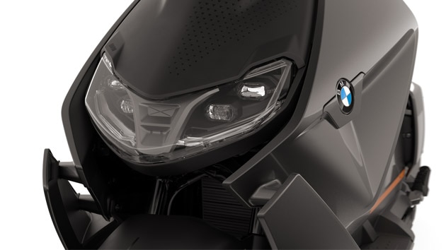 Front of the BMW CE 04 focusing on the LED headlights.